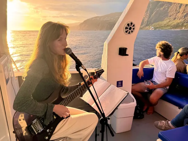 Sunset party with live music onboard a catamaran in Madeira